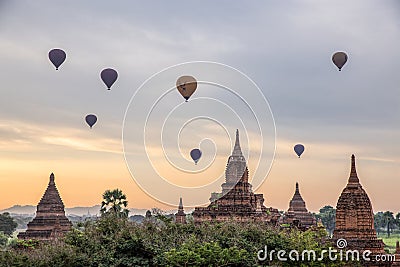 Pagoda and Balloon at Sunrise in Bagan Myanmar Stock Photo