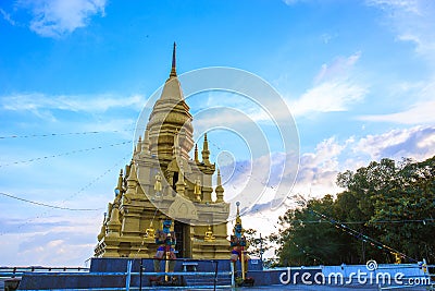Pagoda yellow gold at Wat Laem Sor of the Buddhist seaside sky b Stock Photo