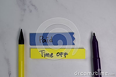 Paid Time Off write on sticky notes isolated on office desk Stock Photo