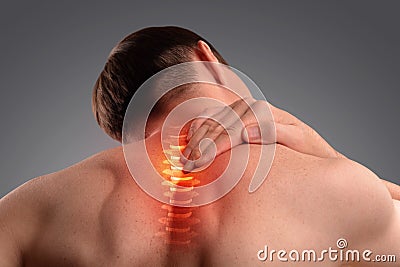 Pain in the cervical spine. Inflammation of the vertebra Stock Photo