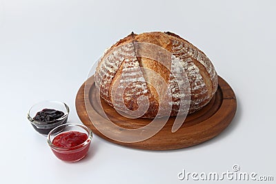 pain de campagne french bread with strawberry jam isolated on white background Stock Photo
