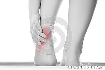 Pain in the female foot Stock Photo