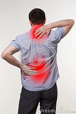 Pain in the male body, man with backache, sciatica and scoliosis, chiropractor treatment concept Stock Photo