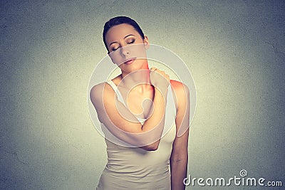 Pain. Woman with painful neck shoulder colored in red Stock Photo