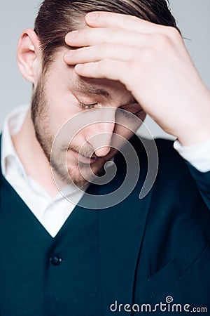 Painful memories. Man think about stressful horrible events from his past. Guy regret of his actions in past. Man Stock Photo