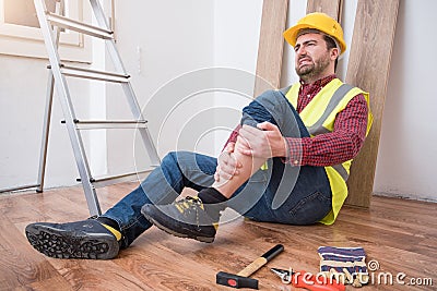 Painful worker after on the job injury Stock Photo