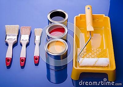 Paint brush and cans Stock Photo