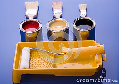 Paint brush and cans Stock Photo