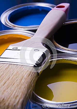 Paint brush and cans Stock Photo