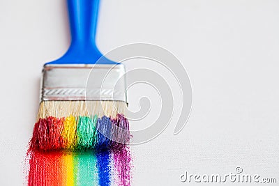 Paint brush closeup and multicolor rainbow brush strokes Stock Photo