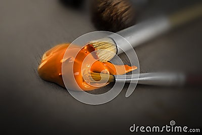 Paint Glob and Crumpled Paint Brush Stock Photo