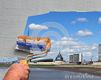 A paint roller of a painter man paint a picture from Bremerhaven on the wall Stock Photo