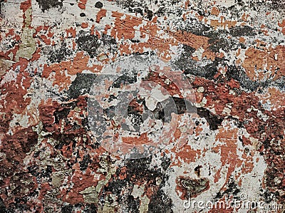 Abstract Dark Grunge wall texture background. Paint cracking off dark wall with rust underneath.distressed crackled texture. Stock Photo