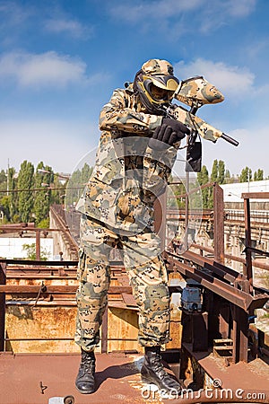 Paintball player in abandoned place Stock Photo