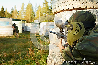 Paintball player under attack Stock Photo