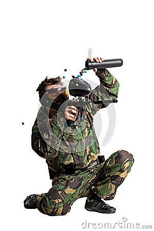 Paintball team in action forest location Stock Photo