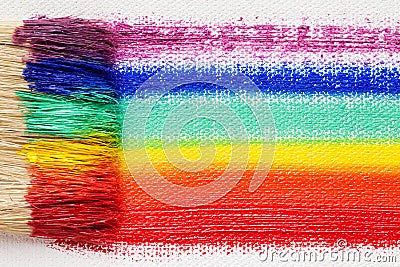 Paintbrush bristle closeup and multicolor rainbow brush strokes Stock Photo