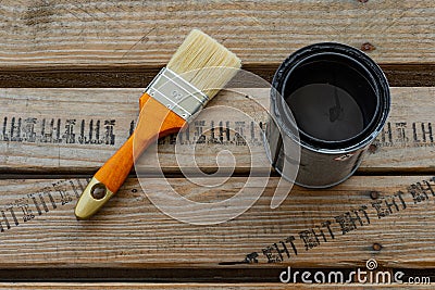 Paintbrush and can with color for home renovation Stock Photo