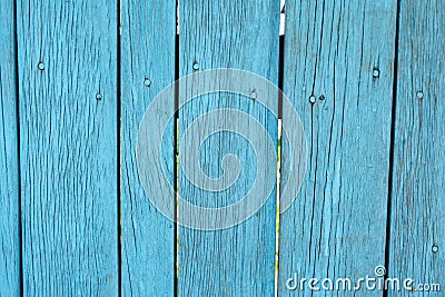 Painted blue old faded wooden planking background with flaws Stock Photo