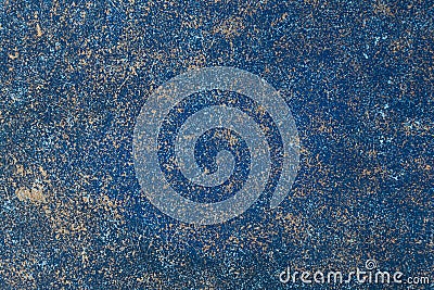 Painted blue vintage wall with golden spots. Wall background. Dark blue backdrop Stock Photo