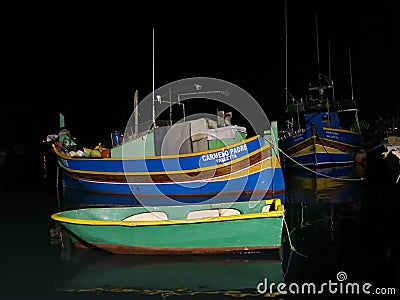 Painted boats in harbor, Marsaxlokk, Malta Editorial Stock Photo