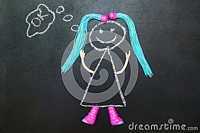 Painted with chalk girl with pigtails thinking Stock Photo
