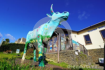 Painted cow sculpture on public display Editorial Stock Photo