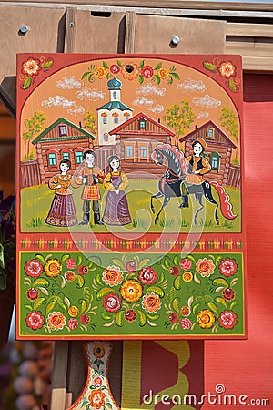 Painted cutting boards for sale at the festival of Slavic culture, timed to celebrate the Day of Russia Editorial Stock Photo