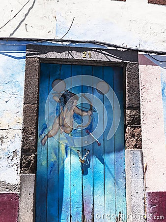 Painted door in the centre of Funchal on the Island of Madiera Editorial Stock Photo