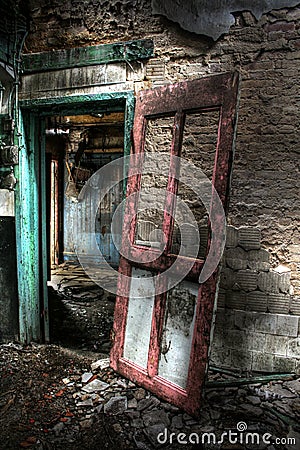 Painted doorway in abandoned house Stock Photo