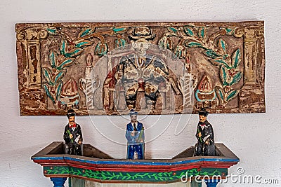 Painted fresco with 3 statures, Finca La Azotea, La Antigua, Guatemala Editorial Stock Photo