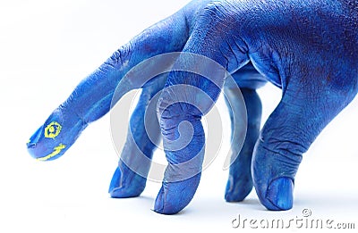 painted hand, blue dinosaur Stock Photo