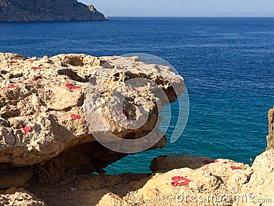 Painted hearts on a rock Stock Photo