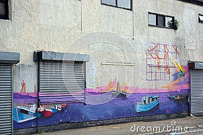 Fishmongers painted mural on wall Editorial Stock Photo