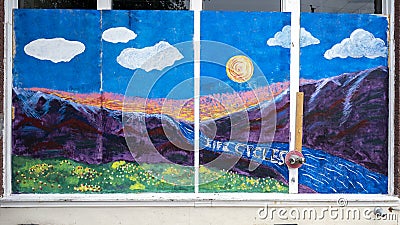 Painted plywood mural symbolizing life cycles in Deep Ellum, Dallas, during the George Floyd protests. Editorial Stock Photo