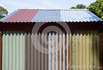 Painted and rusty corrugated iron Stock Photo