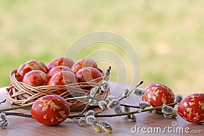 Speckled Easter Eggs and Willow Twigs Stock Photo