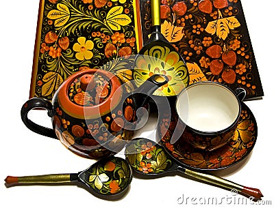 Painted wooden dishes, Hohloma style, Russia Stock Photo