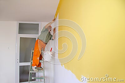 Painter in action Stock Photo