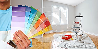 Painter hand with colors Stock Photo