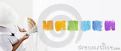 Painter man with color swatches in your hand, Choice colors Stock Photo