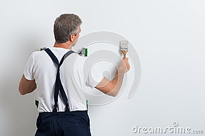 Painter Painting Wall Stock Photo