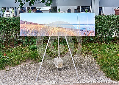 Painting as a souvenir of the beach promenade in Binz on the Baltic Sea Editorial Stock Photo