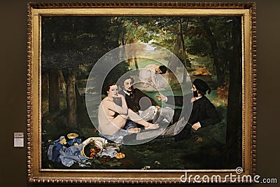 Painting `Breakfast on the grass` by Eduard Manet. 1863. Located in the Museum d`Orsay. Paris. 01.10.2011 Editorial Stock Photo