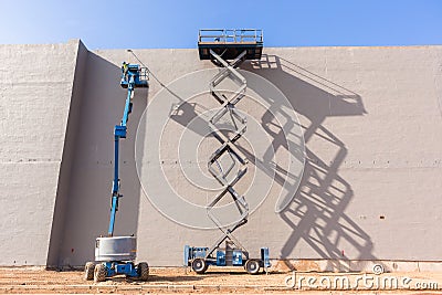 Painting Building Mechanical Booms Stock Photo