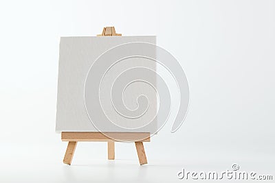 Painting easel with empty canvas Stock Photo