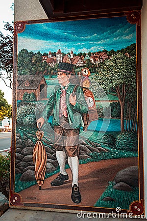 Painting on the entrance of a clock shop in Frakenmuth Michigan Editorial Stock Photo