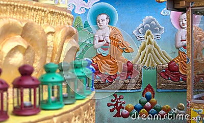 Painting at the foot of the large Buddha statue at Kagyu Yeunten Gyamtso Ling Editorial Stock Photo