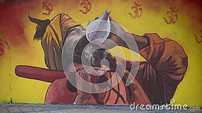 Painting of Indian Hindu religious saint at Holy city of Haridwar during largest festival of India Kumbh Mela 2021 Editorial Stock Photo