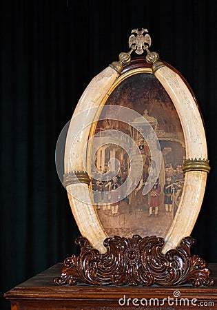 Painting of jambusavaari of Mysore framed with elephant tusks inside Mysore palace Stock Photo